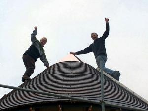 A Staffs Blue roof being installed by a talented self build team